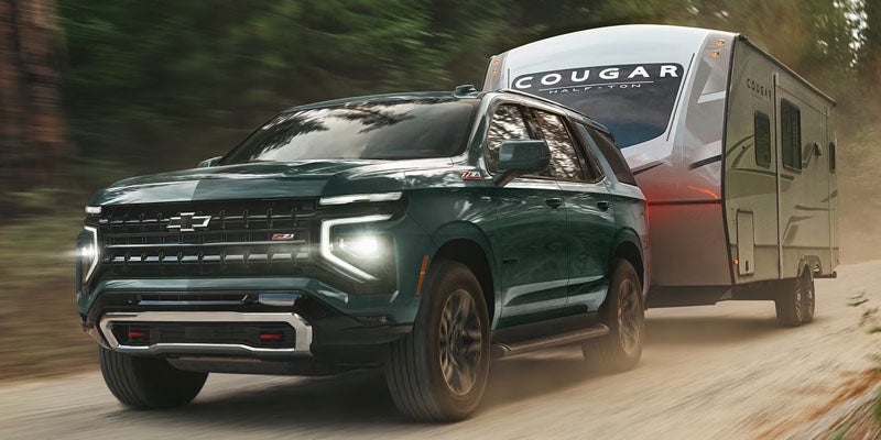 Green 2026 Chevrolet Tahoe towing trailer near Belton, SC