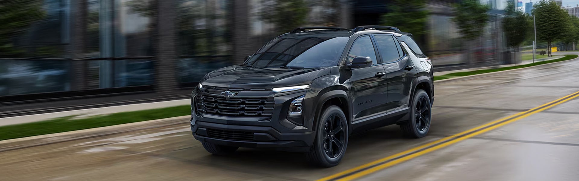 Black 2027 Chevrolet Equinox driving near Belton, SC