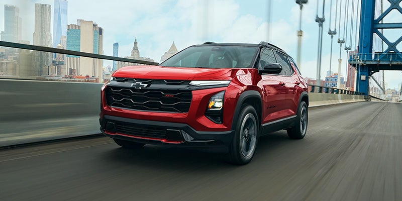 Red 2027 Chevrolet Equinox driving on bridge near Belton, SC